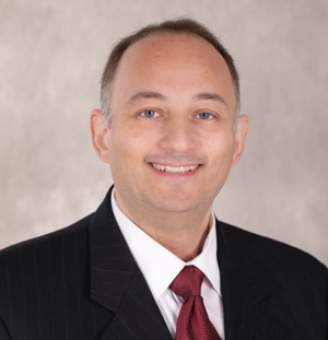 A headshot of Michael Schostak.