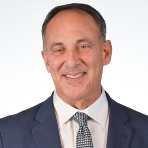 A headshot of Neal Barnett.