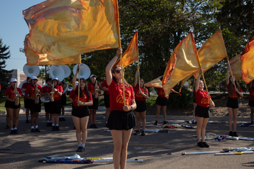 Color Guard performing with the Bloomfield Hills High School Marching band