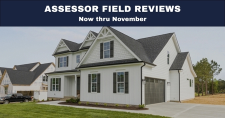 A newly constructed home with message that reads Assessor Field Reviews Now thru November